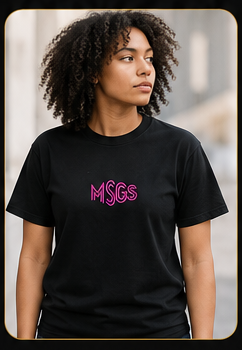 Person wearing the black Faith Church T-shirt showing the centered MSGS front design